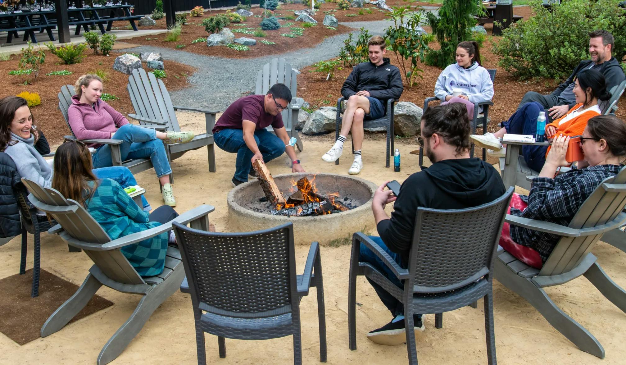 Gathering for a campfire at the offsite